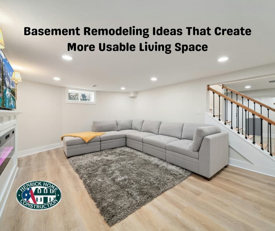 Finished basement living space with cream-toned walls and comfortable seating